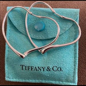 Like new Authentic large Tiffany and co heart hooped earrings.